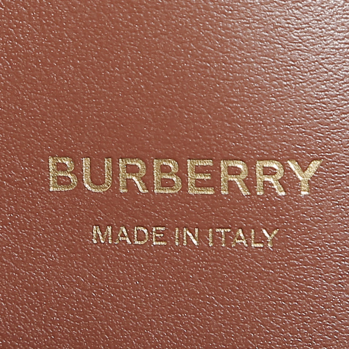 Bolso de mano Burberry   en cuero negro y color oro y lona estampada con diseños - Detail D4