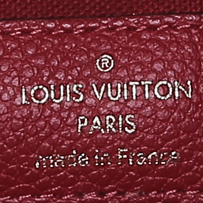 Louis Vuitton Félicie shoulder bag in red empreinte monogram leather - Detail D3
