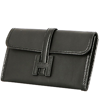 Bolsito de mano Hermès  Jige en cuero swift negro y piel de lagarto negra