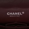 Chanel  Timeless Jumbo shoulder bag  in black quilted grained leather - Detail D9 thumbnail