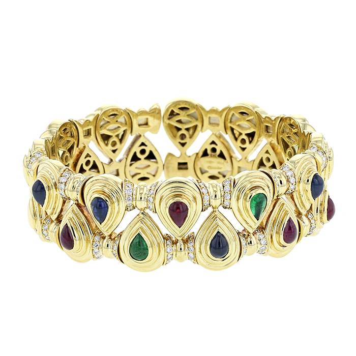Bracciale semirigido Vintage  in oro giallo, zaffiro, rubini, smeraldi e diamanti