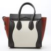 Bolso de mano Celine  Luggage Micro en cuero granulado negro rojo y blanco - Detail D7 thumbnail