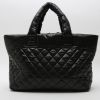 Chanel  Coco Cocoon shopping bag  in black quilted canvas - Detail D7 thumbnail