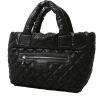 Chanel  Coco Cocoon bag worn on the shoulder or carried in the hand  in black quilted canvas  and black leather - 00pp thumbnail