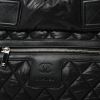 Bolso para llevar al hombro o en la mano Chanel  Coco Cocoon en lona acolchada negra y cuero negro - Detail D1 thumbnail