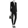 Louis Vuitton  Capucines MM handbag  in black grained leather - Detail D1 thumbnail