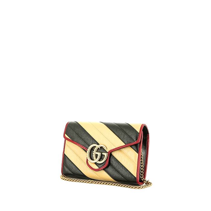 Gucci  GG Marmont shoulder bag  in black and gold quilted leather - 00pp