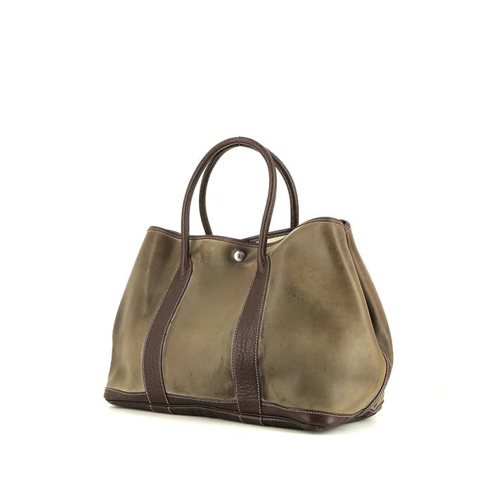 Hermès  Garden Party shopping bag  in dark green plastic  and brown leather - 00pp