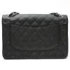 Chanel  Timeless Jumbo shoulder bag  in black quilted grained leather - Detail D8 thumbnail