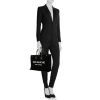 Shopping bag Saint Laurent  Rive Gauche in tela nera e pelle nera - Detail D1 thumbnail