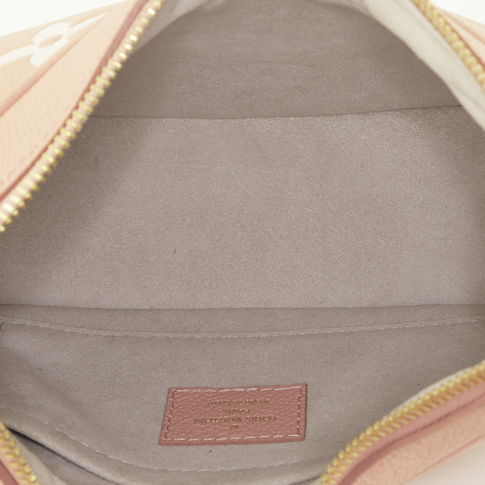 Louis Vuitton  Bagatelle shoulder bag  in pink Trianon and cream color empreinte monogram leather - Detail D3
