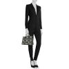 Louis Vuitton  Onthego medium model  shopping bag  in black and beige monogram leather - Detail D1 thumbnail