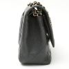Chanel  Timeless Jumbo shoulder bag  in black quilted grained leather - Detail D7 thumbnail