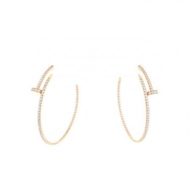 Orecchini a cerchio Cartier Juste un clou modello grande in oro rosa e diamanti