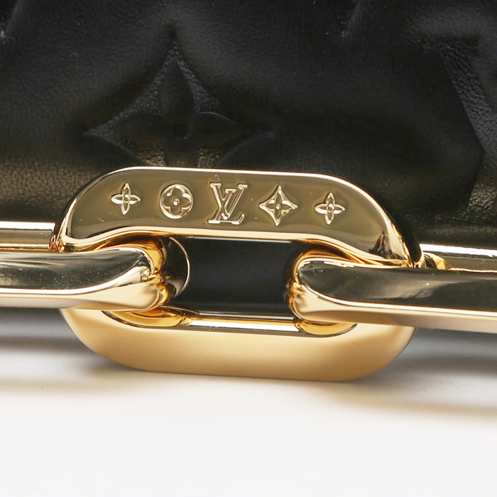 Louis Vuitton Coussin handbag in black empreinte monogram leather - Detail D1