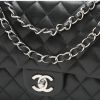 Chanel  Timeless Classic medium model  handbag  in black quilted leather - Detail D1 thumbnail