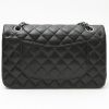 Chanel  Timeless Classic medium model  handbag  in black quilted leather - Detail D8 thumbnail