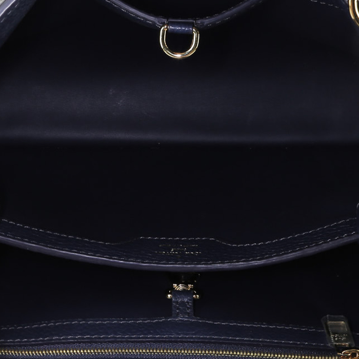 Louis Vuitton  Capucines MM handbag  in navy blue leather taurillon clémence  and beige python - Detail D3