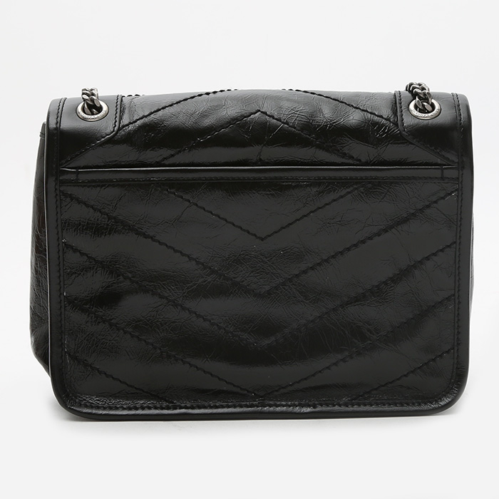 Sac bandoulière Saint Laurent Niki Baby en cuir noir - Detail D8