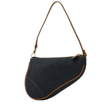 Bolso de mano Dior  Saddle en lona denim azul y cuero marrón