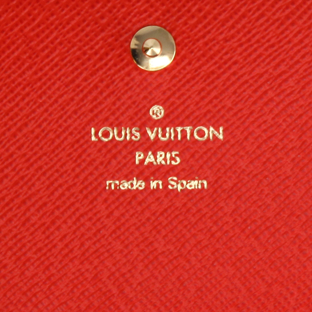Portafogli Louis Vuitton   in tela monogram marrone e pelle rossa - Detail D9