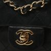 Bolso de mano Chanel  Timeless en cuero acolchado negro - Detail D1 thumbnail