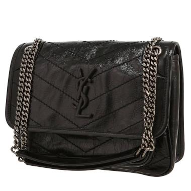 Bolso bandolera Saint Laurent  Niki Baby en cuero acolchado con motivos de espigas negro