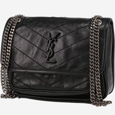 Bolso bandolera Saint Laurent  Niki Baby en cuero acolchado con motivos de espigas negro