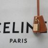 Shopping bag Celine  Vertical in tela beige e pelle marrone - Detail D1 thumbnail