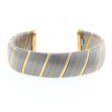 Bracciale a cerchio Cartier  in oro giallo e acciaio