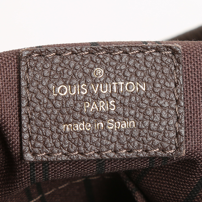 Louis Vuitton Artsy handbag in brown empreinte monogram leather - Detail D4