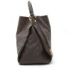 Louis Vuitton  Artsy handbag  in brown empreinte monogram leather - Detail D6 thumbnail