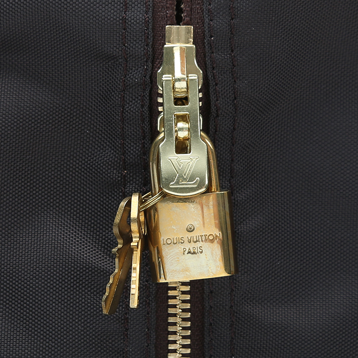 Porta abiti Louis Vuitton  Porte-habits in tela monogram marrone e pelle naturale - Detail D1