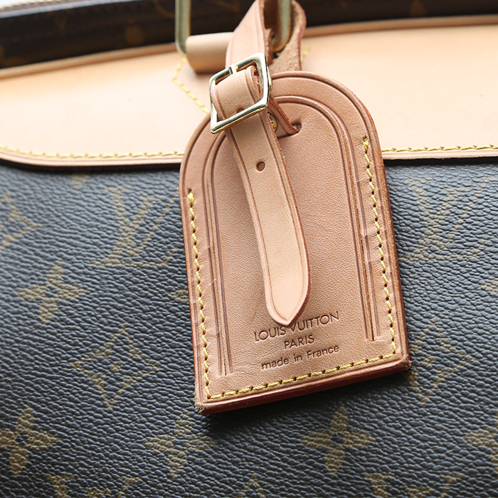 Sac de voyage Louis Vuitton Alize en toile monogram marron et cuir naturel - Detail D1
