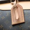 Louis Vuitton  Alize travel bag  in brown monogram canvas  and natural leather - Detail D1 thumbnail