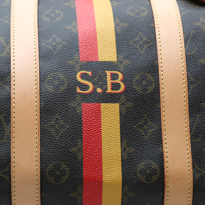 Sac de voyage Louis Vuitton  Keepall 55 en toile monogram marron et cuir naturel - Detail D1