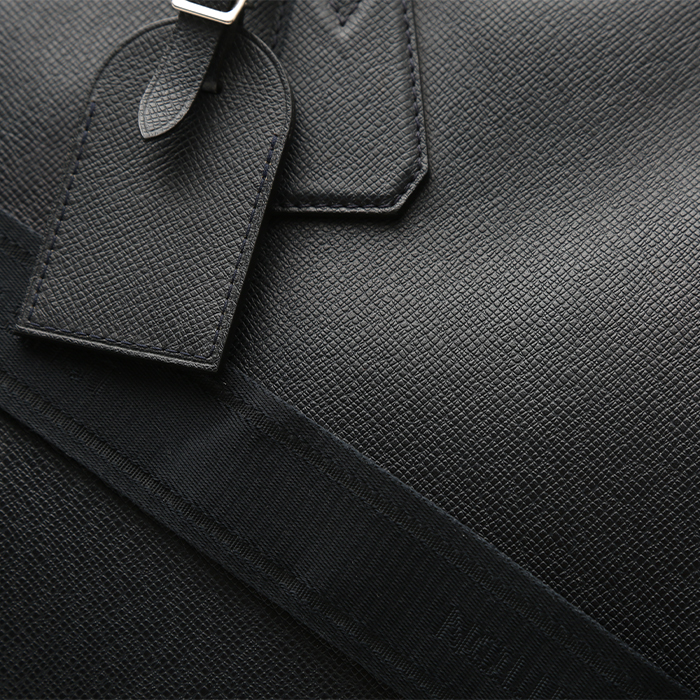 Louis Vuitton Kendall travel bag in anthracite grey taiga leather - Detail D1