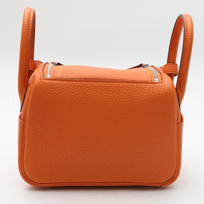 Hermès  Lindy mini  shoulder bag  in orange leather taurillon clémence - Detail D7