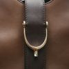 Bolso de mano Gucci  Stirrup en cuero marrón - Detail D1 thumbnail