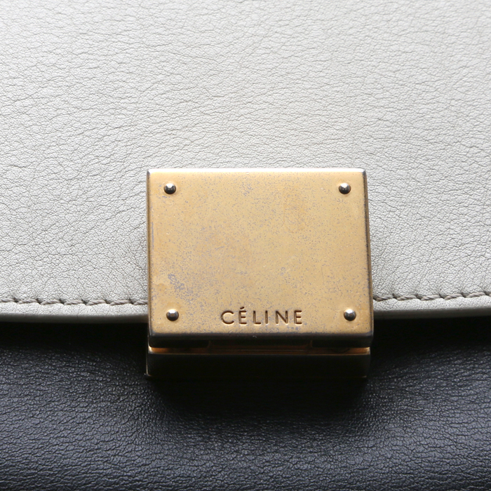 Bolso de mano Celine  Trapeze modelo mediano  en cuero beige y negro y lona beige - Detail D1