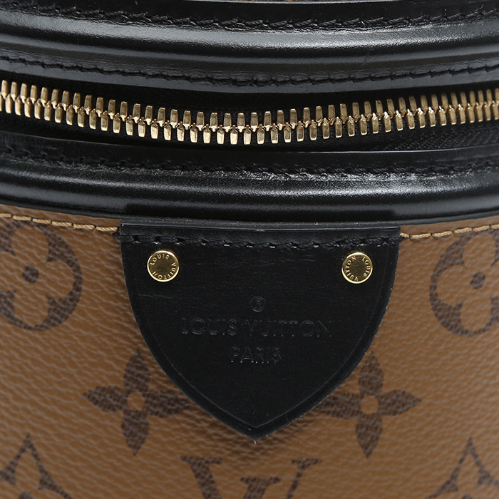 Louis Vuitton Cannes handbag in brown monogram canvas and black leather - Detail D1