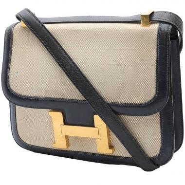 Sac à main Hermès  Constance en cuir box bleu-marine et toile beige