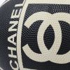 Chanel, Rugby ball, sport accessory, in black and white grained rubber, limited edition, with the logo and its original dustbag, from the 2000's - Detail D1 thumbnail