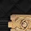 Bolso bandolera Chanel  Mini Boy en cuero acolchado negro - Detail D1 thumbnail