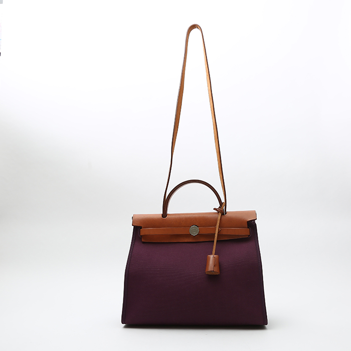 Hermès  Herbag bag worn on the shoulder or carried in the hand  in purple canvas  and natural Hunter cowhide - Detail D9