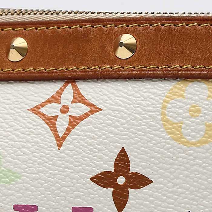 Bolsito de mano Louis Vuitton  Pochette accessoires en lona Monogram blanca y cuero natural - Detail D1