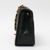 Chanel  Mademoiselle bag worn on the shoulder or carried in the hand  in black quilted leather - Detail D5 thumbnail