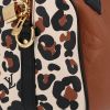 Bolso bandolera Louis Vuitton  Editions Limitées en cuero monogram huella marrón y beige - Detail D1 thumbnail