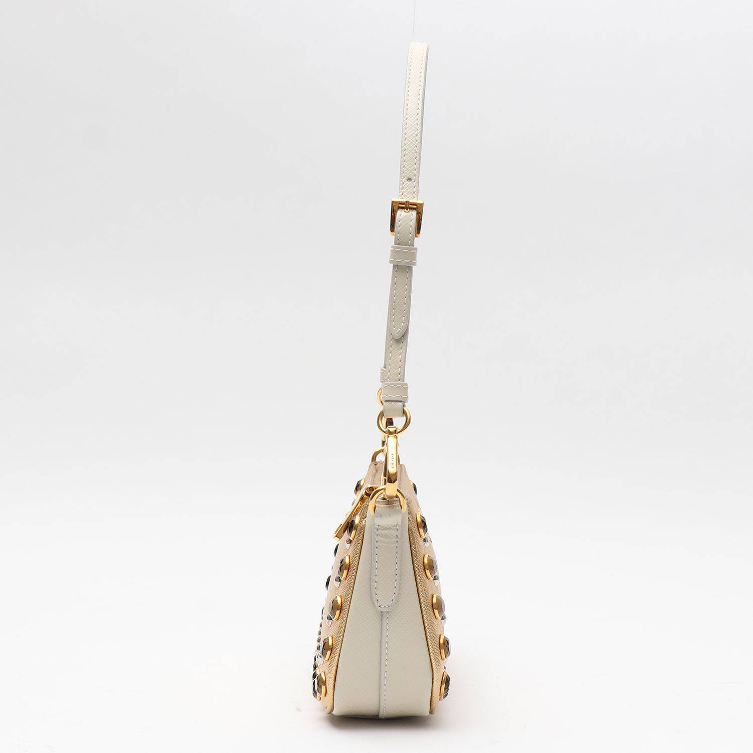 Bolso de mano Prada   en cuero saffiano dorado y blanco - Detail D6