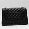 Chanel  Timeless Maxi Jumbo handbag  in black quilted leather - Detail D7 thumbnail